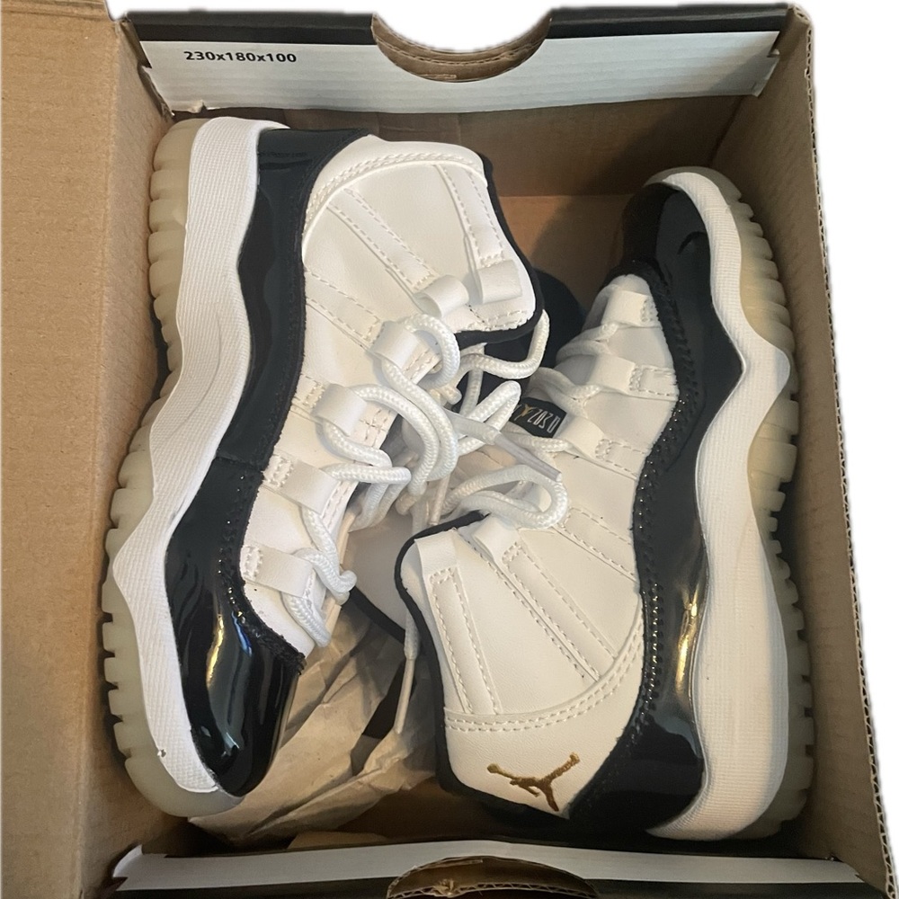 Jordan 11 Retro White and Black Sneakers